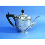 A Victorian silver Tea Pot, by Army & Navy Cooperative Society Ltd, hallmarked London, 1888, of oval