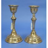 A pair of George V silver Candlesticks, by Charles Boyton & Son Ltd, hallmarked London, 1919, with