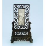 An early 20thC small Chinese Screen, the rectangular ivory plaque engraved and stained with a