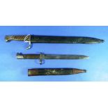 A German M1898/05 Bayonet, with scabbard, and a German M1871 bayonet, with scabbard (2) THIS LOT