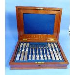 A Victorian canteen of twenty-four silver-handled Dessert Knifes and Forks, Sheffield hallmarks, the