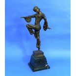 An Art Deco bronze figure of a Dancer, after Demetre Chiparus, she in one-legged dancing pose in