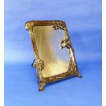 A WMF Art Nouveau polished pewter Table Mirror, circa 1906, modelled with a maiden, foliage and