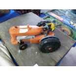 Marx Reversible Diesel Electric Tractor, red, plastic, battery operated.