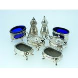 A pair of George V silver open Salts, hallmarked Birmingham, 1914, of oval form with blue glass