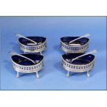 A set of four Edwardian silver Salts, by Kemp Brothers, hallmarked London, 1906, of oval form with