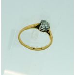 A single stone diamond Ring, c.½ct, mounted in 18ct yellow gold and platinum, Size N. THIS LOT