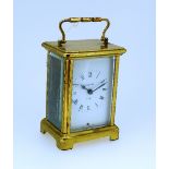 A French gilt brass Carriage Clock, of five-glass form, the brass dial with silvered chapter ring