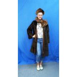 A vintage dark brown Fur Coat, approx. size M, together with a brown mink scarf and a fur beret (