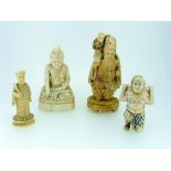 A Japanese carved ivory figure of a Sage, inlaid with mother of pearl, he standing with a child on