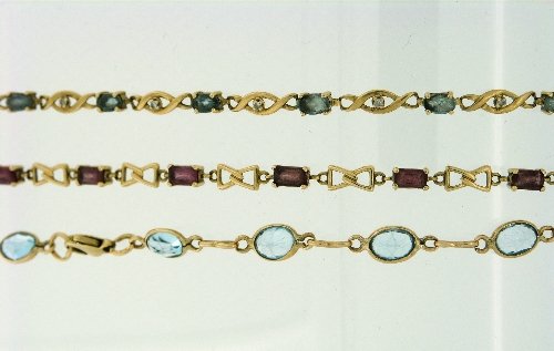 Three Bracelets, one in 9k yellow gold comprising eleven pale blue stones between yellow gold links, - Image 2 of 2