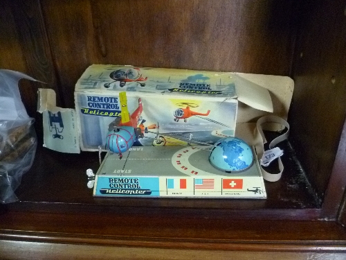 A German tinplate clockwork Remote Control Helicopter, circa 1950's, boxed. THIS LOT WILL BE SOLD ON