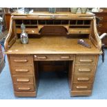 An early 20thC oak estate Desk
