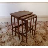 An Edwardian mahogany nest of three Tables, 22in (56cm) wide (3) Provenance: Stoodley Knowle School,