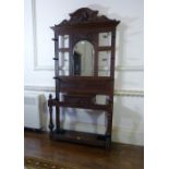 A Victorian carved oak Hall Stand, 46in (117cm) wide. Provenance: Stoodley Knowle School, Torquay.