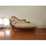 A Victorian walnut Chaise Longue, with carved decoration, 74in (188cm) long. Provenance: Stoodley