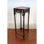 A 19thC Chinese Stand, with pierced geometric decoration, 40½in (103cm) high. Provenance: Stoodley