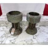 A near matched pair of hewn and polished stone holy water Fonts (2) Provenance: Stoodley Knowle