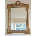 A giltwood and moulded wall Mirror, 32in (81cm) wide. Provenance: Stoodley Knowle School, Torquay.