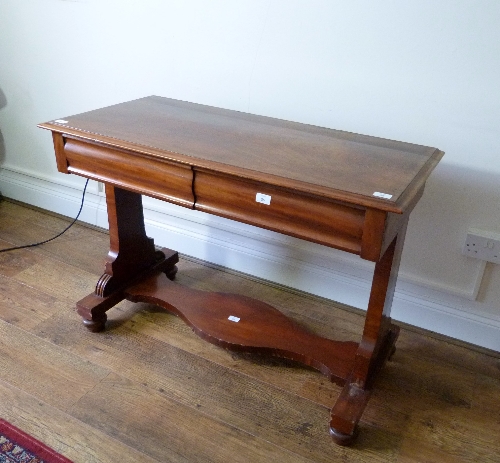 A Victorian mahogany side Table, with two blind frieze drawers, 42in (107cm) wide. Provenance: