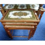 A 1970s tile top mahogany coffee Table, and matching nest of three Tables (4)