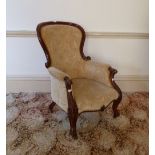 A Victorian walnut gentleman's Armchair, with upholstered back, arms and seat. Provenance: