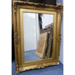 An ornate gilt wood framed rectangular Mirror