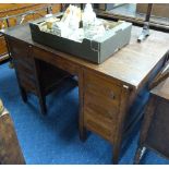 A mid 20thC oak Desk