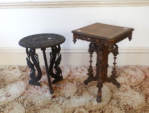 A Victorian ornate carved oak occasional Table, and another carved occasional table (2)