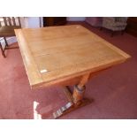An oak draw-leaf Dining Table, with bulbous turned legs. Provenance: Stoodley Knowle School,