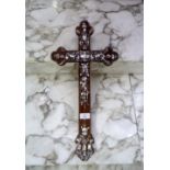 A rosewood Cross, with mother-of-pearl floral inlays, some losses, 21¼in (54cm) high. Provenance: