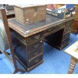 An Edwardian oak pedestal Desk, with leather inset top.