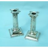 A pair of Victorian silver Candlesticks, by Martin Hall & Co, hallmarked London, 1892, the fluted