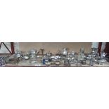 A quantity of silver-plated items, including a four-piece tea set, egg-cup stand, entrée dish, toast