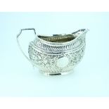 A Victorian silver Cream Jug, by Atkin Brothers, hallmarked Sheffield, 1898, of oval form with