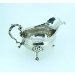 A George V silver Sauce Boat, by Collingwood & Sons Ltd, hallmarked Birmingham, 1916, with scroll