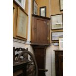 A 19th Century oak wall hanging corner cabinet.