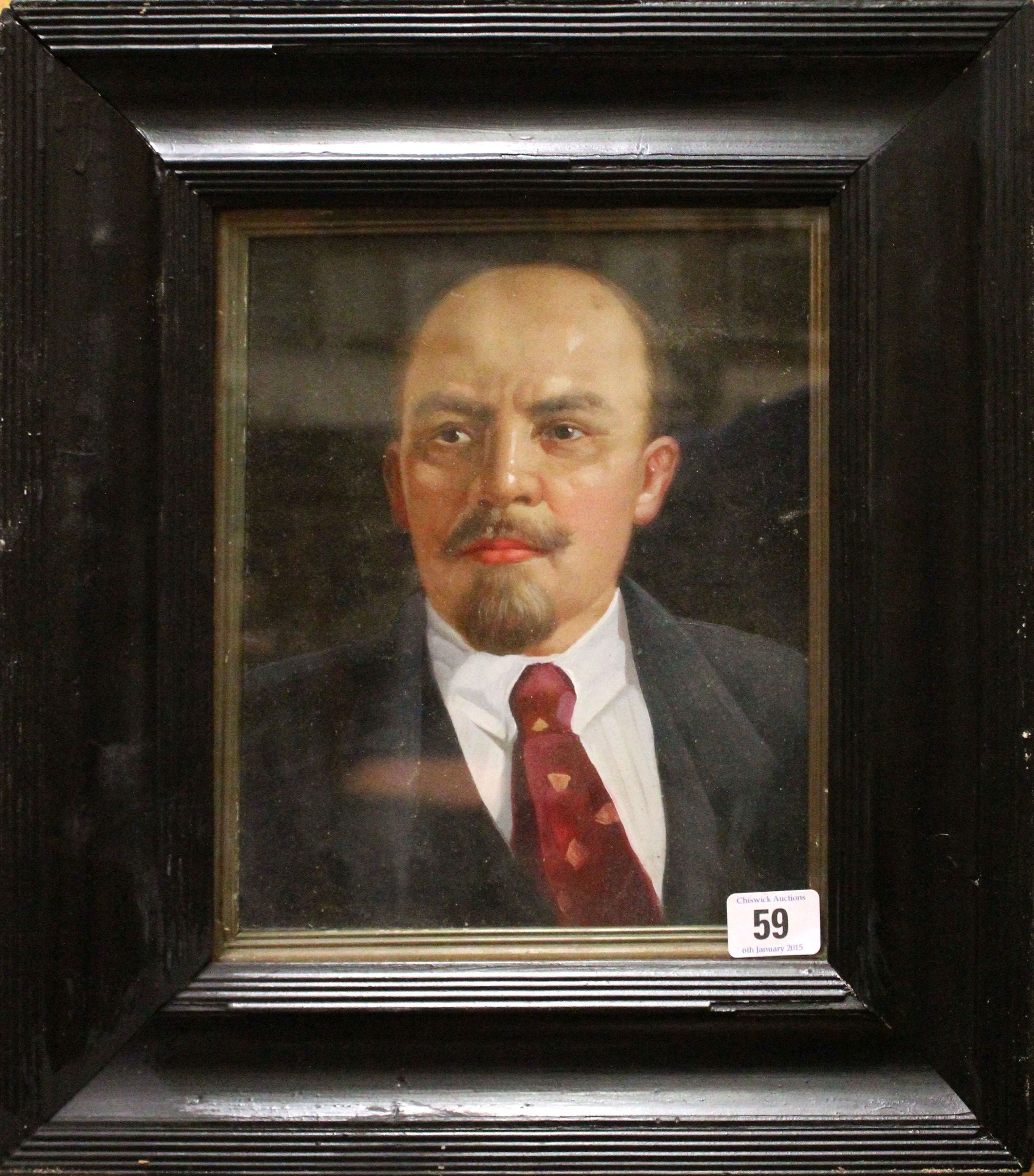 A framed oil painting portrait of Vladimir Lenin (chairman of the Council of Peoples Commissars of