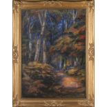 L. Lowe, an early 20th Century forest landscape view with trees, pastel, signed, 50 x 36cm.