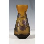 After Emile Gallé (1846-1904), a small cameo glass vase, amber tinted, overlaid and acid-etched with
