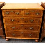 A 19th Century walnut chest of drawers, crossbanding, bar-bar pole inlay, 2/3 graduated drawers with