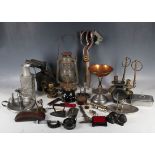 A mixed collection of metalwork, to include candlesticks, lantern, bicycle lamp, tailor's