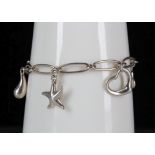 A Tiffany & Co, Elsa Peretti design .925 silver charm bracelet, set with bean, eternal circle,