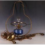 An Edwardian rise and fall lamp, brass double arm light with leaf decoration, 55cm W, with