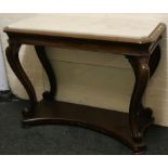 A 19th Century mahogany and marble topped hall table, with moulded scrolling cabriole legs joined by