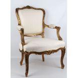 A 19th Century French giltwood and cream damask upholstered fauteuil.