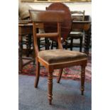 A set of four mahogany bar-back dining chairs, with stuff-over seats, raised on turned legs. (4)