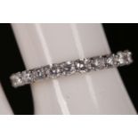 An 18ct white gold and diamond set full eternity ring, approx. 1.75ct, size K.