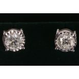 A pair of 18ct white gold and diamond screw back diamond studs, 2.13ct.