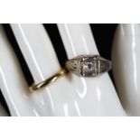 A gents 14k white gold and diamond set dress ring, together with an 18ct gold wedding band. (2)